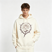 Sweat à capuche oversize blanc ivoire avec broderie Rose Épine et accent en strass, poche, style streetwear