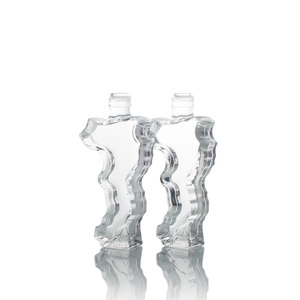 Bouteilles en verre personnalisées à haute teneur en silex, nouveau design unique en verre transparent pour whisky vodka brandy rhum gin <span class=keywords><strong>tequila</strong></span> avec bouchon en liège - Product Image 1