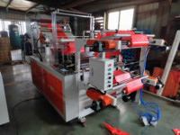 Machine automatique de fabrication de sacs à rouleaux avec noyau