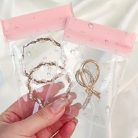 Sac à fermeture éclair en EVA givré avec logo personnalisé, pochette à fermeture éclair réutilisable en EVA pour emballages de boucles d'oreilles, bagues, colliers, vente en gros OEM/ODM