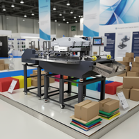 Imprimante industrielle CMYK 2026 à passage unique, alimentation automatique haute vitesse, sacs en kraft, boîtes en carton ondulé, OnePass CMYK