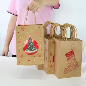 Wholesale Kraft Paper <strong>Christmas</strong> <strong>Gift</strong> <strong>Bags</strong> With Printed Logo for <strong>Craft</strong> <strong>and</strong> Packaging Use for Holiday Shopping - Product Image 1