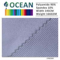 65% Nylon 35% Spandex 40G Tissu en tricot côtelé vertical de haut calibre 115GSM Interlock ultra-extensible pour soutiens-gorge