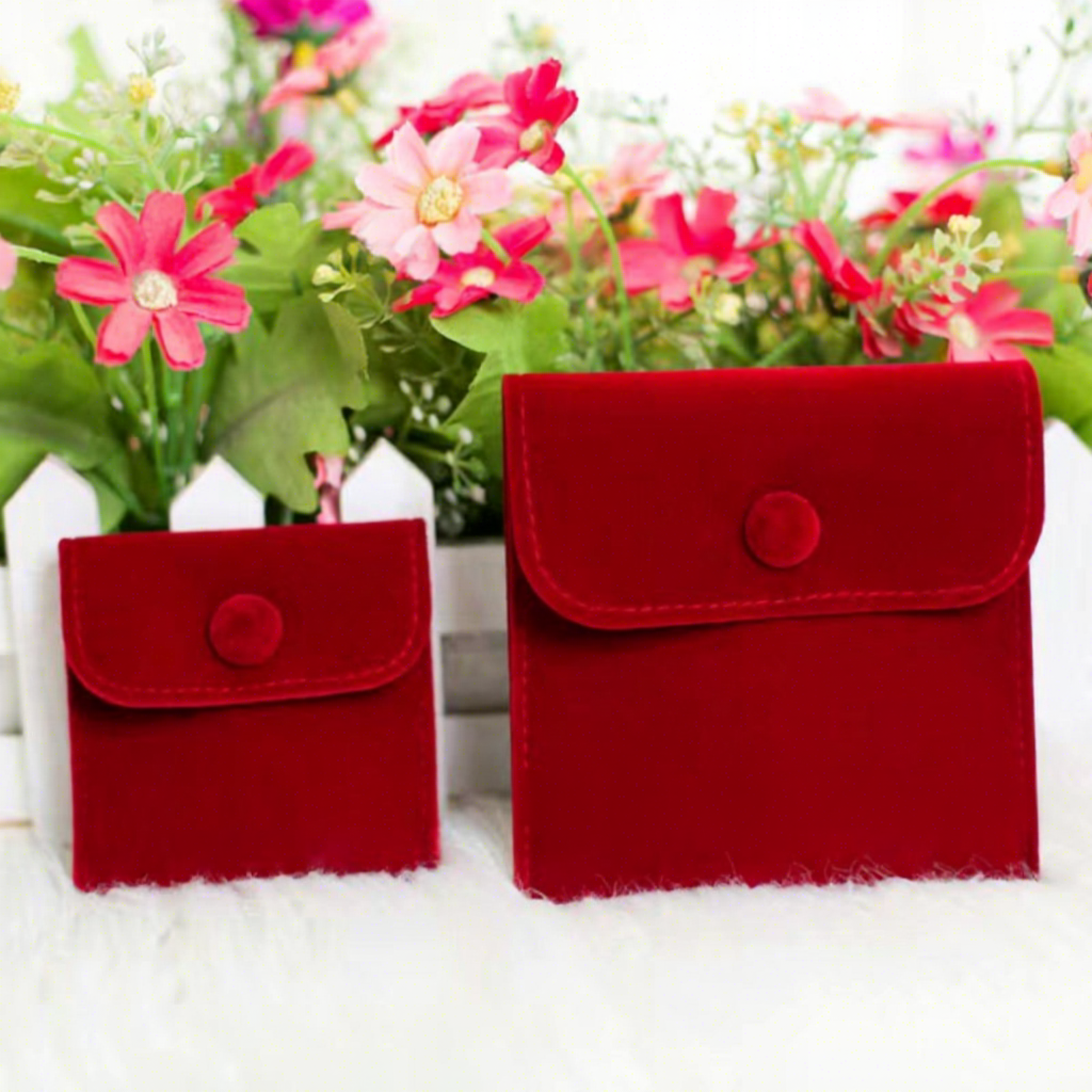 Bolsa de joyería de terciopelo rojo vino