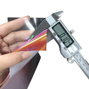 सबसे अधिक बिकने वाली विनाइल डी ट्रांसर्ट डी चलर होलोग्राफिक लोपल विनाइल कपड़ों के लिए लोहे के अनुकूल एचटीवी गर्मी हस्तांतरण विनाइल - Product Image 3