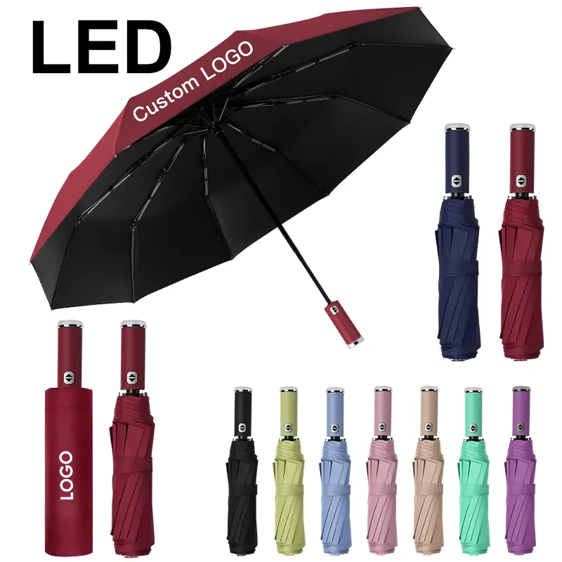 LED-lampe vinyl individuelles logo vollautomatisch winddicht dreifach zusammenklappbar geschäftsregenschirm mit steuerbarem led-licht