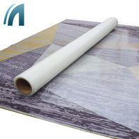 Film d'emballage transparent anti-poussière personnalisé en PE souple adhésif moulé par soufflage, résistant à l'humidité, pour la protection des tapis de voiture en rouleau