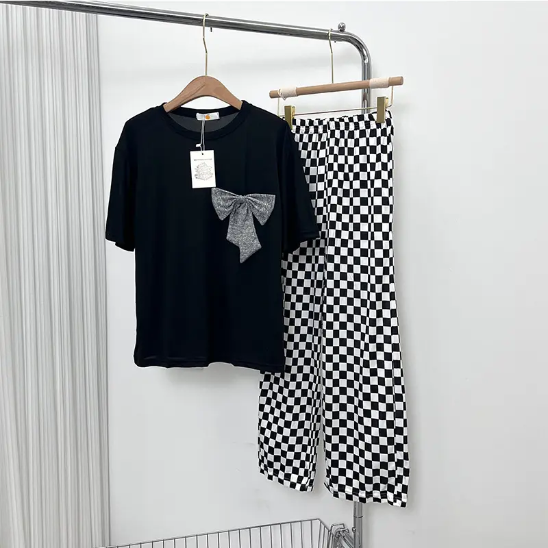 Bogen Sneaky Design Basic Style Schwarzes T-Shirt Gitter Lose Hosen Mädchen Zweiteiliger Außenhandels anzug