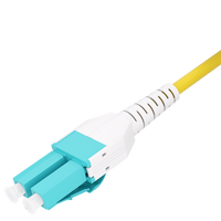 Kabel Patch Fiber 1m (3ft) 2 Fiber LC UPC Duplex ke LC UPC Duplex Switchable Clip Uniboot Multimode (OM3) Riser (OFNR) 2.0mm