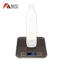 Bouteille en plastique PET de 900 ml de qualité alimentaire jetable pour boissons (thé, soda, eau minérale) avec bouchon inviolable