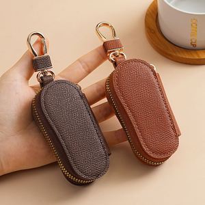 Étui à clés unisexe en cuir PU avec petite plaque de protection et fermeture éclair pour télécommande de voiture, porte-clés en métal et plastique - Product Image 4