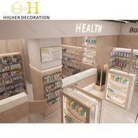 Meuble de pharmacie moderne et lumineux, combinant rangement et présentation, avec tiroirs et vitrine