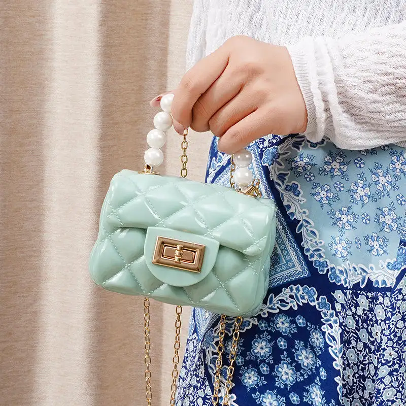 Tas penjualan terlaris tas jeli genggam mutiara modis tas tangan mewah di Eropa untuk wanita tas tangan persegi tunggal