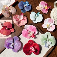 Pince à cheveux tendance 2026 en cristal avec fleur de Phalaenopsis pour femme – Élégante pince latérale pour séances photo et tenues de vacances