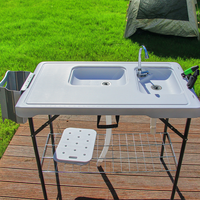 Table à poisson blanche portable au design moderne pour nettoyer les légumes à poisson à l'intérieur