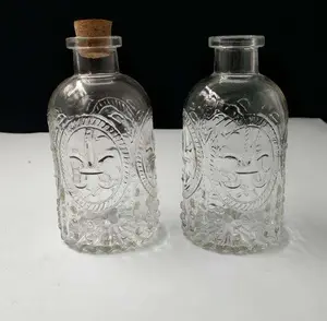 aromatic glass pack bottle with carving round clear glasses revival mode for hot sale with cork 8 oz