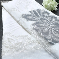 Tissu en dentelle brodé de perles et de paillettes, prix usine Chine, collection 2026, idéal pour mariages et célébrations