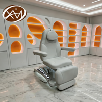 Table de massage électrique réglable et pliable de luxe pour salon de beauté et salle de sport, avec fonctionnalités d'extension de cils et de soins du visage