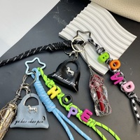 Nouveau Pendentif de sac en corde à lettres original, en acier inoxydable, avec porte-rouge à lèvres et sac en maille, porte-clés et décoration de sac à dos