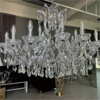 Lustres en cristal transparents à cadre argenté luxueux personnalisés Saixin pour la décoration de plafond d'événements