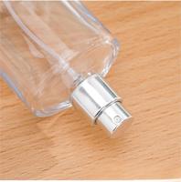 Bouteille de parfum en verre de luxe de haute qualité 30ml 50ml verre transparent volcanique avec bouchon de pulvérisateur de pompe en gros