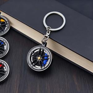 พวงกุญแจโลหะหมุนได้แบบขายส่ง สำหรับโปรโมชั่น ตกแต่งด้วยล้อดูดซับแรงกระแทก รูปทรงเทอร์โบรถยนต์ เหมาะสำหรับเป็นของขวัญ - Product Image 5