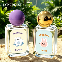Botol Parfum Kaca Mini Murah Pabrik 30ml 50ml 100ml Botol Parfum Bulat Transparan Kosong dengan Pompa Semprot dan Tutup Bola Berwarna