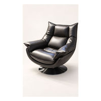 Fauteuil de salon moderne en cuir noir, pivotant, avec siège rembourré en mousse et base en métal, idéal pour coin lecture ou hôtel