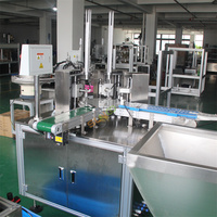 Machine à grande vitesse pour l'insertion de joints et le pliage de bouchons en plastique, machine automatique pour le doublage de bouchons