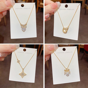 Collares de Cobre Chapados <span class=keywords><strong>en</strong></span> Oro de 14K para Mujer, Delicados, Antideslustre, con Colgantes de Flor, Lazo y Corazón, Venta al Por Mayor - Product Image 1