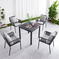Table et chaise de balcon de jardin Chaise de canne d'extérieur Table et ensemble de trois pièces de loisirs
