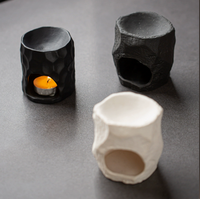 Brûleur d'arômes en céramique noire texturée effet pierre, design grotte, pour bougies chauffe-plat, huiles essentielles et cires fondantes, décoration Wabi Sabi