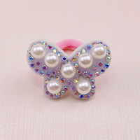 En gros : Accessoires de cheveux faits main : Élastiques à cheveux en perles, papillons, cordes à cheveux en forme de cœur, élastiques à cheveux en forme d'étoiles avec strass