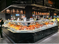 Vitrine réfrigérée commerciale en acier inoxydable avec verre incurvé pour charcuterie, viande crue et aliments cuits