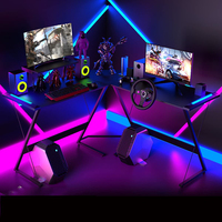 Foshan meubles de bureau à domicile Gamer bureau de jeu professionnel en forme de L noir personnalisé moderne lumière rvb coin table d'ordinateur