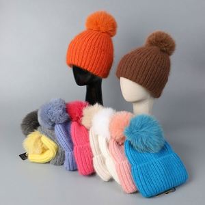 Bonnet en laine et fourrure de lapin hiver 2025 avec pompon, protection épaissie pour les oreilles, tricoté, couleur unie, élégant - Product Image 1