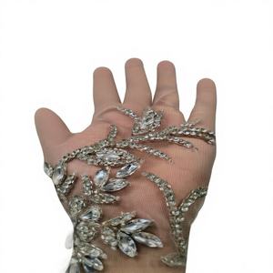 Colección Empress, Tela de Vestido Ligera Hecha a Mano con Diseño Floral, 100% Poliéster, Encaje Negro Premium con Pedrería y Trabajo Elaborado - Product Image 1