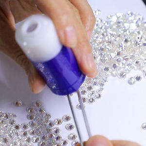 Piedras de moissanita sueltas pequeñas incoloras VVS1 excelente corte redondo para joyas de diamantes personalizadas 1,0 quilates/bolsa - Product Image 2