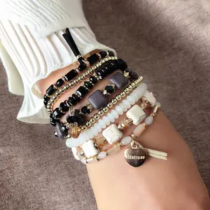 Neues handgemachtes Geflecht 4-teiliges Set Crystal Layer Stretch Bead Armband für Frauen