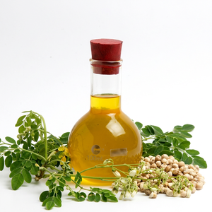 Food Grade Moringa Oil in Liquid Form Wild-Cultivated Packaged in Bottle or Drum - Product Image 1