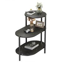 Table basse de style italien avec plateau en pierre frittée arrondi et structure métallique pour salon, balcon, coin canapé