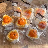 Boule de riz triangulaire au jaune d'œuf salé virale Xiaohongshu, en silicone souple anti-stress à rebond lent pour filles et garçons