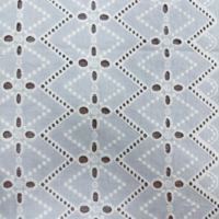 Tissu en dentelle brodée à œillets en coton blanc pour robe