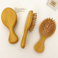 Brosse à cheveux démêlante antistatique en bois de bambou avec coussin de massage et technologie laser, idéale pour les voyages et la maison