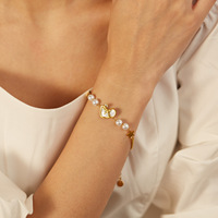 Bracelet élégant pour femme en acier inoxydable, design minimaliste étoile avec nacre et perle battement de cœur, idéal pour le quotidien