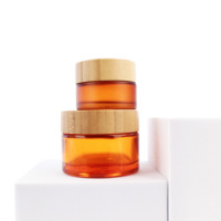 Diskon besar mewah 5g 15g 30g 50g 100g 2oz 4oz bambu kemasan kosmetik Amber oranye stoples kaca krim dengan tutup bambu BJ12C