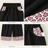 Celana Kulot Hitam untuk Anak Perempuan dengan Panel Saku Motif Leopard Pink dan Pita Kontras di Bagian Bawah untuk Koleksi Pakaian Anak Grosir dan Kustom