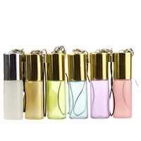 Flacon roll-on en verre de 3 ml, 5 ml, 10 ml pour huiles essentielles et parfums, avec bouchon pendentif transparent, argenté ou doré