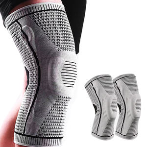 El soporte de rodillera de compresión deportiva de nailon de alta calidad con resorte doble <span class=keywords><strong>y</strong></span> almohadilla de esponja proporciona seguridad de protección en los deportes - Product Image 1