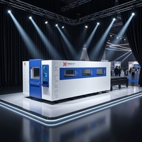 Machine de découpe laser à fibre 6 kW haute puissance, très demandée, avec cabine de protection et plateforme d'échange pour tubes et profilés